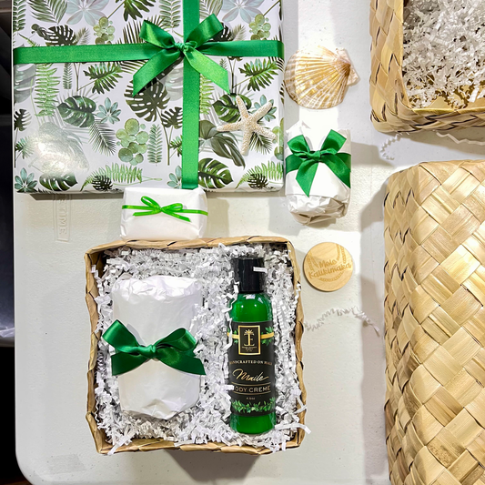 holiday gifts with hawaiian wrapping paper in lauhala baskets with sea shells and wooden aloha tags