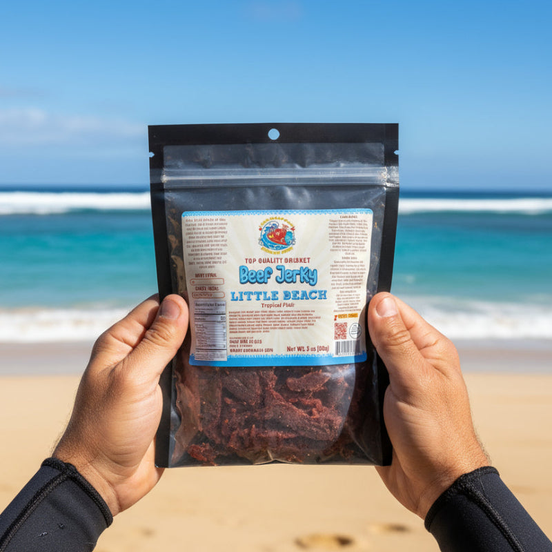 Packaged beef jerky with a label on a beach background