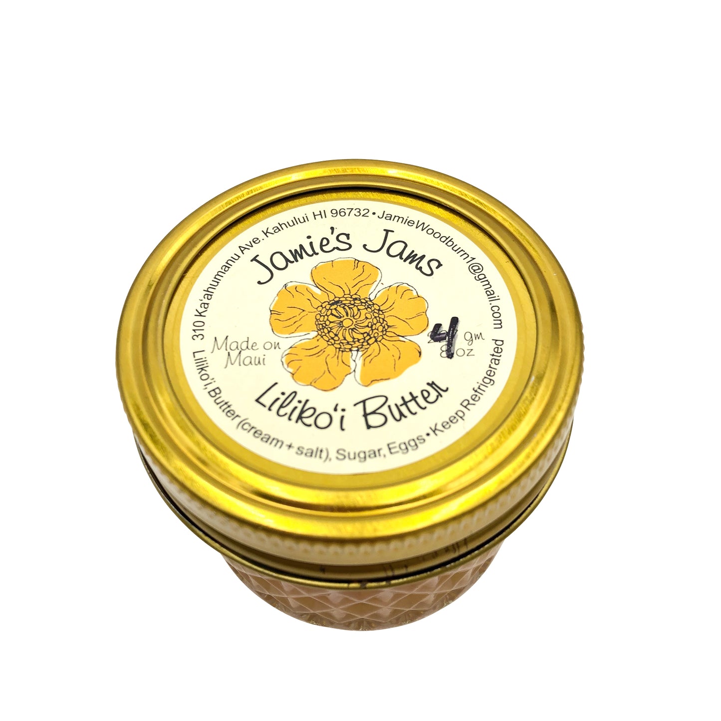 Jar of Lililo'i Butter with gold lid and floral label on a white background