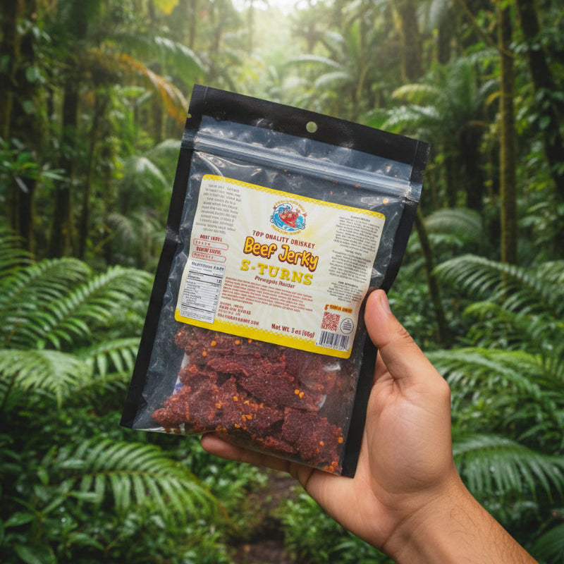 Hand holding a package of beef jerky with a jungle background
