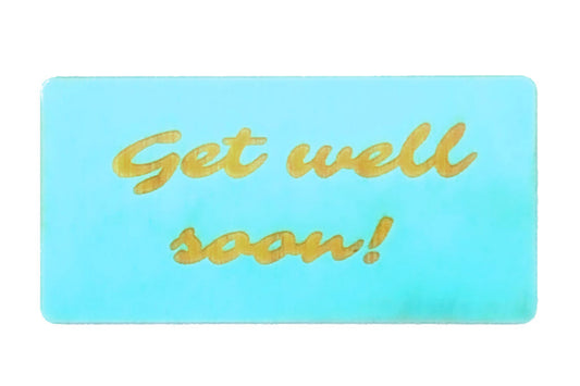 A handmade wooden gift tag with 'Get well soon!' painted in yellow on a turquoise background.