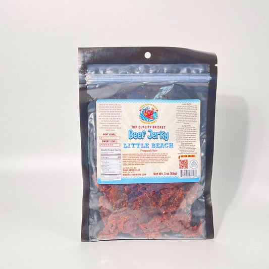Packaged beef jerky with a label on a white background