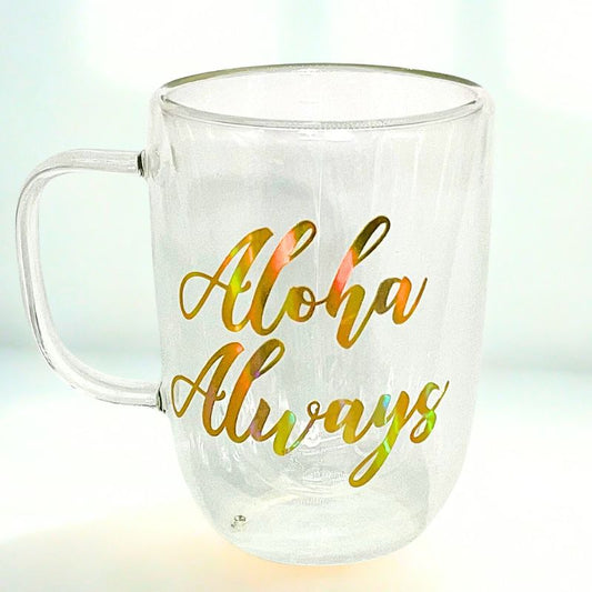 Clear mug with 'Aloha Always' text in gold on a light background