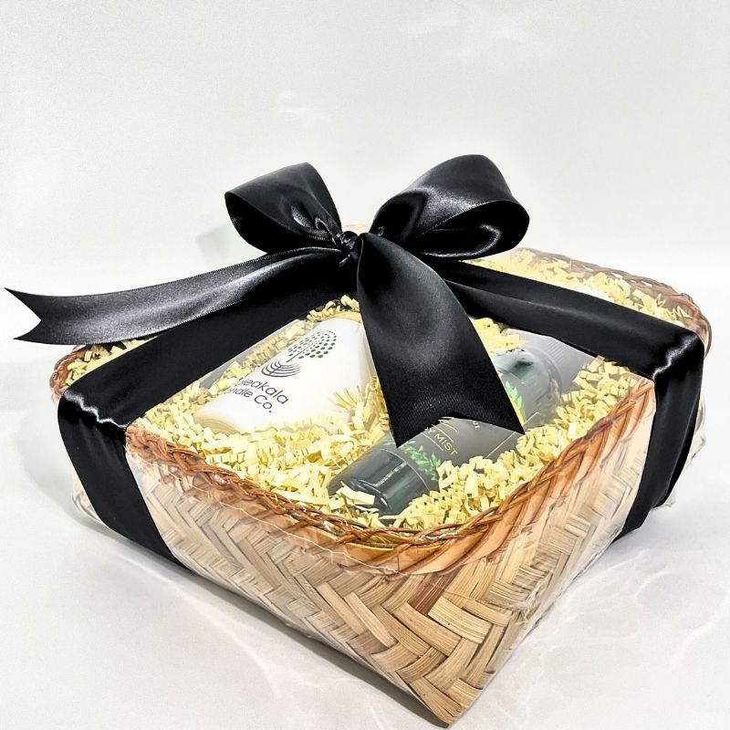 Gift basket with a black ribbon on a white background