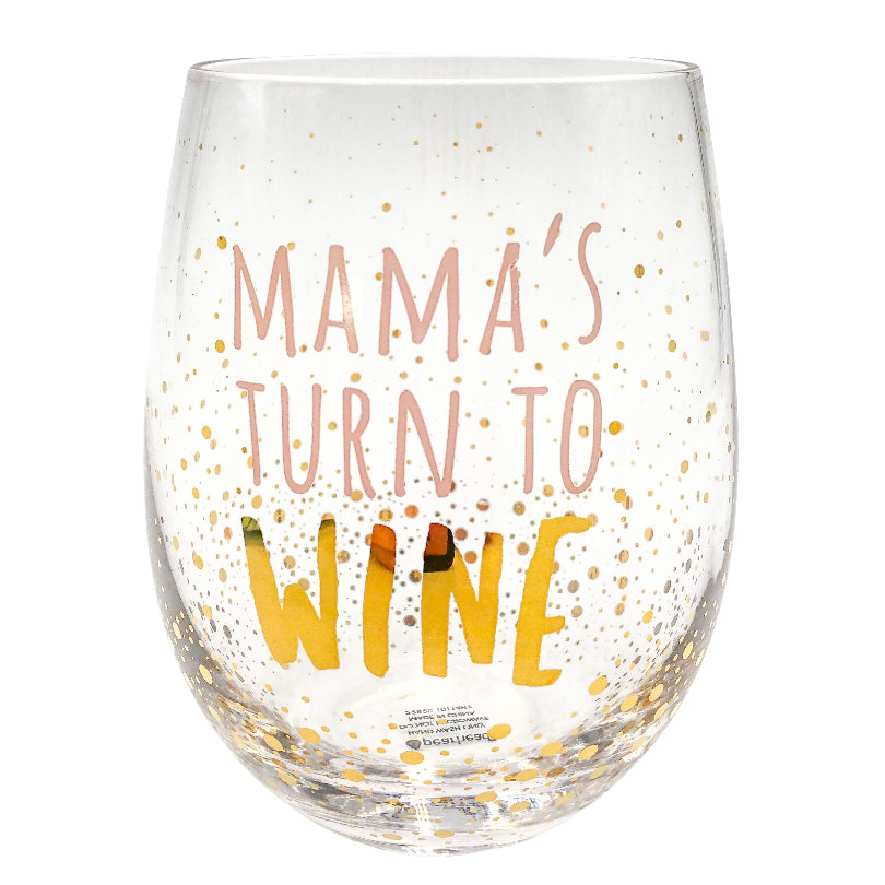 A stemless wine glass with gold speckles and the text 'MAMA'S TURN TO WINE' in a playful font.