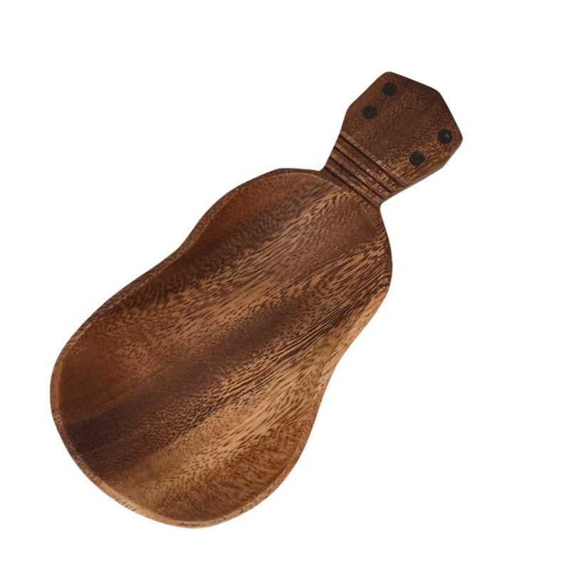 Wooden spoon-shaped tray on a white background